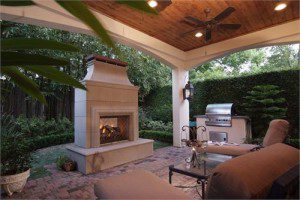 Wood Covered Patio With Custom Outdoor Fireplace